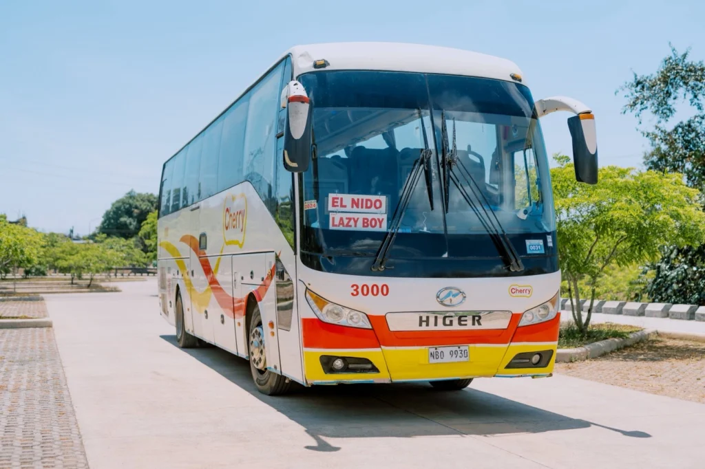 Cherry Bus coach 3000, signed EL NIDO LAZY BOY, at the terminal before its Puerto Princesa to El Nido run.