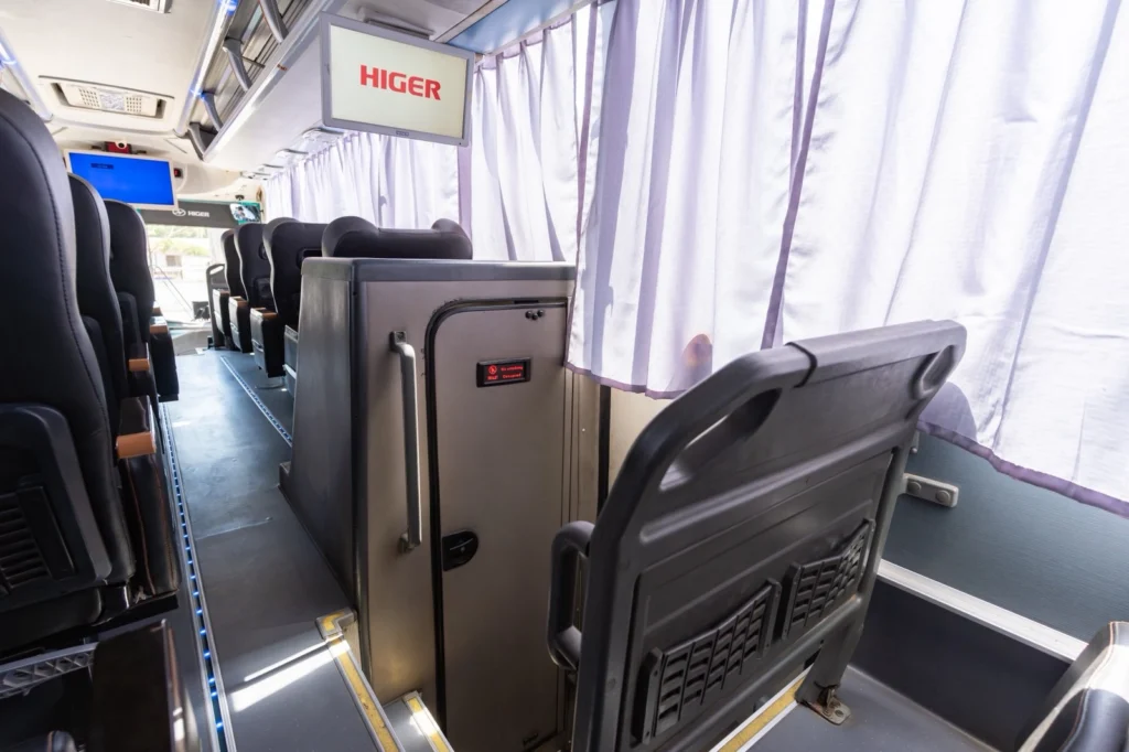 The onboard toilet cubicle inside a Cherry Bus Lazyboy Elite coach.